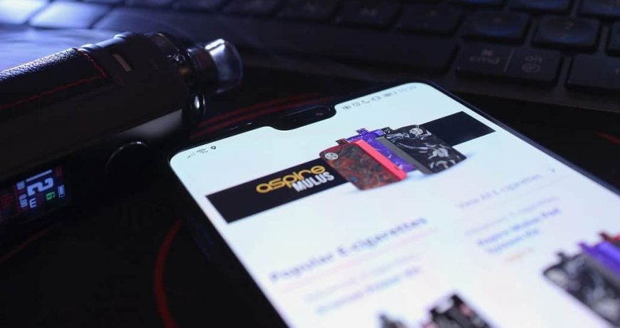 VapeApe Online Vape Shop on mobile with VooPoo e-cigarette and Keyboard Logi