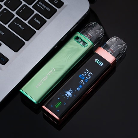 Caliburn G3 Pro beside laptop apple